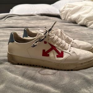 White Off white shoes with red arrow